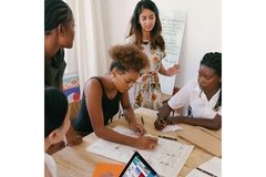 Students working together on a start-up for the food system.