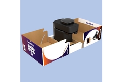 A black coffee machine in a box