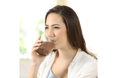 Image Woman drinks Glucerna Protein Smart Shake