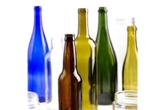 Image A group of empty bottles in different colors.