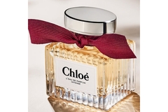 Image square perfume bottle with a bow