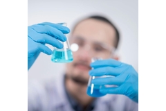 Image Man doing science in lab