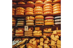 Cheese wheels on a shelf