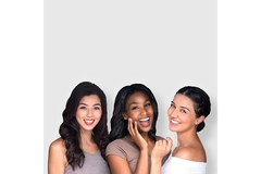 Image Black, Asian and racially ambiguous girls pose together