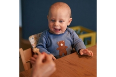 Image Toddler looking forward to his meal