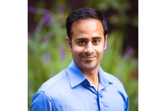 Image Varma headshot smiling