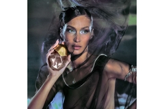 Image bella hadid behind veil holding perfume bottle
