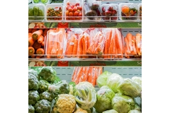 Image A shelf of packaged vegetables and fruits