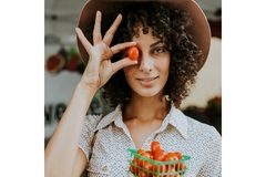 Woman with tomatoes.