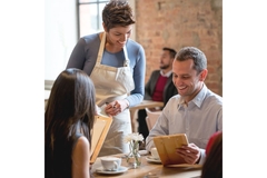 Image People ordering food from a menu without calorie labels.
