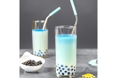 Image two glasses of blue milk tea.