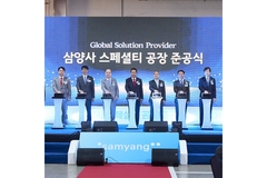 seven men in suits on a stage.
