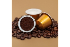 three coffee pods and coffee beans.