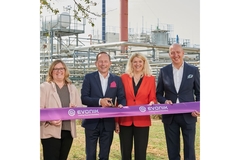 Image Four evonik execs stand in front on the plant behind a ribbon