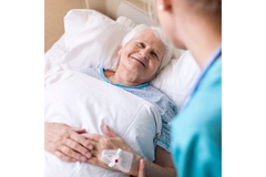 A patient on a hospital bed.