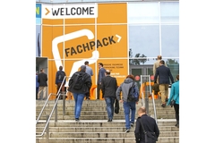 Image People entering trade show building.