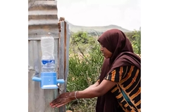 Image An Ethiopian woman washing her hands.