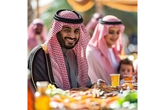 Image Saudi Arabian family eating food outside.