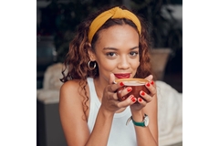 Image Woman drinks coffee