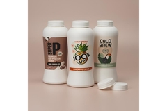 A group of white plastic bottles.