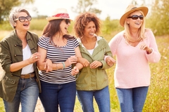 Image Women out for a stroll on a sunny day.