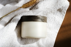 Image cosmetic container on towel