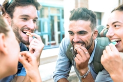 Image People eating candy.