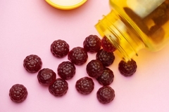 Bottle with gummy supplements.