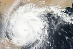 A hurricane from a satalite over water and land.