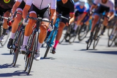 Image A bike race with many competitors.
