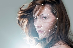 womans face traced with digital points and network