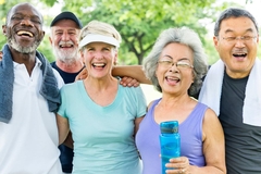 Image Active seniors smiling in the camera.
