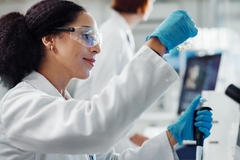 Image Researcher analyzing gut microbes.