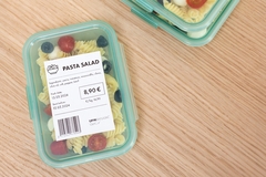 Image A plastic container with label on it.