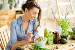 Image Woman eating salad