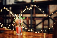 Image Beverage on a table with lights.