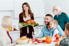 a family on the dining table for thanksgiving