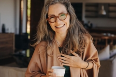 Image Mature, healthy looking woman smiling.