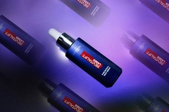 Image Infalliable foundation on top of a purple background.