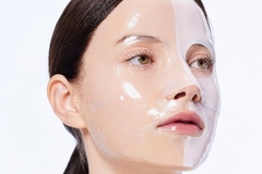 Image A girl with a face mask on and one side is transparent while the other is white.