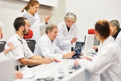 Image Researchers discussing definitions of prebiotics and prebiotic effect.