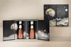A group of bottles in a paper box