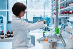 Image A scientist working in a lab.