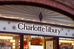 A Charlotte Tilbury sign outside its store.