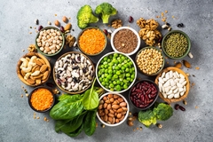 bowls containing peas, legumes, nuts