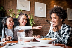 Image Family eating in a restaurant