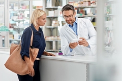 Image A pharmacist helping a customer.
