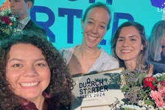Image Three woman smiling in a selfie.