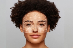 Image A woman with dots on the top of her face.