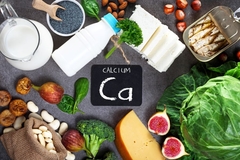 Nuts, milk products and green leafy vegetables laid out